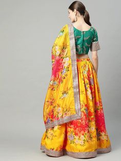 Mustard yellow and green embroidered lehenga choli with dupatta
Green embroidered unstitched blouse
Mustard yellow and red printed semi-stitched lehenga, has drawstring closure, flared hem
Mustard yellow and red printed dupatta, taping border
Size & Fit
Choli at Bust: Customizable upto 42 inches
Lehenga waist: Customizable upto 40 inches
Lehenga Length: 45 inches
Lehenga Flare: 3.40 m
Dupatta Length: 2.20 m
Dupatta Width: 1.05 m
Material & Care
Lehenga fabric: Organza Silk
Blouse fabric: Silk
Le Eid Festive Choli With Printed Motifs, Festive Eid Choli With Printed Motifs, Festive Pista Green Sharara With Printed Motifs, Green Bollywood Style Sharara With Floral Print, Bollywood Style Green Floral Sharara, Traditional Pista Green Anarkali Set With Floral Print, Bollywood Floral Print Sharara For Navratri, Fitted Yellow Palazzo Set With Printed Motifs, Anarkali Choli With Printed Motifs For Festivals