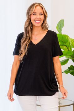 Elevate your wardrobe with our new Take The Day Off Top in black! This v-neckline basic is sure to become your favorite, offering endless styling options that make it a versatile essential for any occasion! Stay comfortable and chic all day long! 57% Polyester, 38% Rayon, 5% Spandex Chic Black V-neck Top With Short Sleeves, Chic Black Long Sleeve V-neck Top, Black V-neck Top Versatile Style, Black V-neck Top For Spring, Short Dresses Party, Summer Chic, Jumpsuit Shorts Rompers, Shoes With Jeans, Shop Maxi Dresses