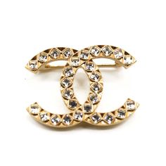 Description Size Length: 2.00 In Height: 1.00 In Comes With Box Pouch Retail Tags Gift Bag This Is An Authentic Chanel Vintage Large Crystal Cc Brooch Gold. This Stunning Brooch Is A Gold Toned Chanel Cc Logo And Is Encrusted With Small Crystals. Enjoy This Brooch For The One Of A Kind Style, From Chanel! Luxury Gold-tone Brooch Jewelry, Luxury Gold-tone Jewelry Brooch, Luxury Gold Brooch For Formal Occasions, Luxury Yellow Gold Pins For Formal Occasions, Luxury Gold Brooches For Formal Occasions, Luxury Gold Pins For Formal Wear, Luxury Gold Pins For Formal Occasions, Gold Wedding Brooches In Chic Style, Chic Gold Brooch For Evening