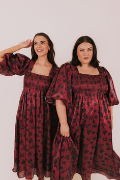 Unleash your inner romantic with the This Heart Of Mine Dress. Featuring a babydoll silhouette and puff sleeves, this midi dress is perfect for a dreamy, feminine look. The smocked bust and back provide a flattering fit, while the square neckline with slight sweetheart elements adds a touch of sweetness. Fully lined, and in a black floral pattern, this dress is both playful and sophisticated. Plus pockets! Details Babydoll silhouette Puff sleeve Fully lined Smocked bust and back Square neckline Nursing Friendly Tops, Nursing Friendly Dress, Black Floral Pattern, Plus Jumpsuit, Pockets Details, Exclusive Dress, Maternity Shops, Basic Dress, Tank Top Long Sleeve