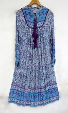 "ITEM DESCRIPTION rayon blue purple printed maxi dress - collared neckline with tassel summer maxi dress - long sleeve boho maxi dress Features: Long sleeve, collared neck, Long dress Material: rayon crepe Fabric: 100% rayon soft light weight ethnic print fabrics  Sleeve Length = 22 inch For more sizes & their measurement, please refer our below chart to understand the sizes variations available with us For your size requirement, please mention your size in seller note at the time of buying. SIZ Purple Boho Dress, Long Sleeve Boho Maxi Dress, Maxi Dress Long Sleeve, Hippie Look, Ethnic Print, Maxi Robes, Long Summer Dresses, Boho Maxi, Boho Maxi Dress