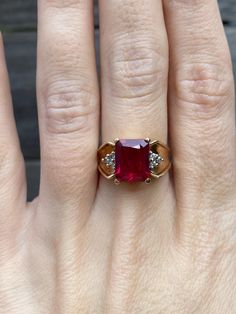 Total Weight: 5 grams Size: 5.75 Band Width: 1.3-9.1mm Ruby: 9.7x7.5mm Diamonds: Under 1mm, very small Condition: Ruby shows some light wear. All gold has been thoroughly checked with an Olympus XRF spectrometer. It is guaranteed 10k gold.  All our jewelry is properly washed and disinfected to ensure customers get clean items with every order.  Returns accepted but may be subjected to a restock fee.  Please message with any questions:) Diamond Ring Band, Ruby Wedding Rings, Creative Jewelry Photography, Ruby Diamond Ring, Ruby Diamond Rings, Jewelry Real, Red Band, Diamond Rings Bands, Jewelry Photography