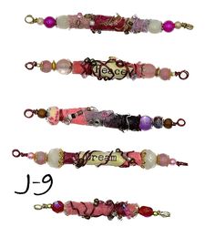 These Boho/Vintage/Gipsy style beads are hand crafted so each one is unique and individual with no one being exactly alike. Listing is for one set of 5 beads.  Beads have been wire wrapped and accented with tiny glass beads, metallic beads, wood beads, 2 beads per set will have a word,  Approximate Dimensions: Length : from smaller 2" to larger 3 1/4 in  Diameter : 1/4 to 3/8 in Pink Bohemian Beaded Bracelets With Large Beads, Bohemian Pink Beaded Bracelets With Large Beads, Pink Bohemian Beaded Bracelet With Large Beads, Large Spiritual Pink Beads, Unique Pink Beads For Jewelry Making, Pink Handmade Custom Beads, Unique Handmade Pink Beads, Bohemian Large Pink Beads, Pink Spacer Beads For Crafting