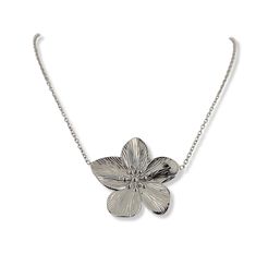 Cherry blossom flowers carry deep and meaningful symbolism for many people. Now you can elevate your look with this stunning necklace adorned with a large, intricately detailed blossom. It's the ideal accessory for any occasion and will be sure to make a statement. Gold PVD 18k or Platinum Chain Length: 16" + 2" extender Flower Size: 32mm x 34mm Every piece of jewelry you order is delivered in an elegant organza bag. For that extra special touch, consider our upgraded Gift Package Option during