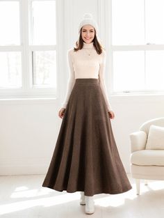 ★★ Welcome to my Ylistyle shop！！！ Embrace the frosty days with this chic A-line, long wool skirt. Perfectly cut for winter, it provides warmth without compromising on style. The high-waisted design exudes a timeless appeal.  ★★FEATURES 35% wool blend, 40% fiber, 25% nylon Polyester lining Back elastic waist Two side pockets Right Zipper closure A-Line wool skirt Maxi wool skirt Long wool skirt Perfect for winter, autumn Dry clean More midi wool skirt: https://etsy.me/3ZmT5UP ★★ Bespoke Order Service If you Request other color Request the length Your height is not between 155 cm- 172 cm Your weight is over 75 kg I can do it for you, It will need some extra fee depending on on your need. Contact with me for more detail. ★★ Get your size in Size Chart with your body measurement https://www.et Winter Pleated Maxi Skirt, Winter Full-length Pleated Skirt, Fitted Full Maxi Skirt For Winter, Fitted Beige Maxi Skirt For Fall, Fall Fitted Beige Maxi Skirt, Fitted Beige Skirt For Winter, Winter Brown Lined Maxi Skirt, Full Length Lined Skirt For Winter, Winter Full Length Lined Skirt