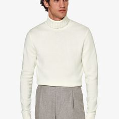 A classic style in a luxurious cashmere blend, this off-white turtleneck sweater is a richly structured and elegantly simple addition to your winter wardrobe whether it's on its own or under a tailored jacket. Classic White Polo Sweater For Work, Classic White Long Sleeve Turtleneck, Elegant Beige Turtleneck For Winter, Elegant Beige Winter Turtleneck, Formal Winter Cashmere Polo Sweater, Luxury White Sweater For Workwear, Classic Solid Sweater For Formal Occasions, Classic Cashmere Turtleneck For Winter, White Fitted Classic Polo Sweater