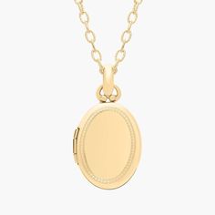 Carry loved ones close with this premium oval locket crafted in 14k yellow gold that opens with a snap clasp to present two photos. Suspended from a forzatina chain necklace, this substantial locket can be engraved on the front for a personalized gift. Classic 14k Gold Locket Necklace For Keepsake, Classic 14k Gold Locket Necklace Keepsake, Classic Oval Locket Necklace Stamped 14k, Yellow Gold Oval Locket Jewelry, Oval Yellow Gold Locket Jewelry, 14k Gold Locket Necklace With Oval Pendant For Anniversary, 14k Gold Oval Link Locket Jewelry, Classic 14k Gold Locket Necklace With Polished Finish, Oval White Gold Locket Jewelry