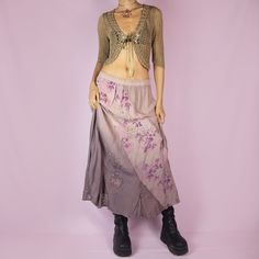 The Vintage 90s Purple A Line Midi Skirt is a dusty pinkish-purple ombre pattern boho maxi skirt with adorned with embroidered floral details, embellished with sequins and beads, and featuring an elastic waistband. ESTIMATED SIZE M TAG SIZE EUR 38 - UK 12 MEASUREMENTS Length 84cm - 33.07 inch Waist 78cm - 30.70 inch Our model is 172 cm tall and usually wears size XS. We ship worldwide from Spain and offer free shipping on all orders when you buy 3 items or more! ♥ https://adultworldshop.etsy.com Vintage Purple Skirt For Summer, Hippie Fitted Maxi Skirt For Spring, Fitted Hippie Maxi Skirt For Spring, Pink Fitted Bohemian Maxi Skirt, Bohemian Fitted Pink Maxi Skirt, Fitted Pink Bohemian Maxi Skirt, Vintage Purple Skirt For Spring, Vintage Skirt For Spring Festival, Bohemian Purple Maxi Skirt For Spring