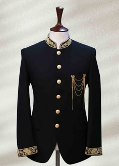 a black suit with gold trimmings and buttons