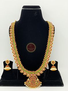 Original Design by Classical Dance Jewelry® -- Colorful And Designer Beautiful Necklace Set For Women. -- You Can Wear this Necklace Set In Parties, Engagement, Weddings, Birthdays, Bharatnatyam And Kuchipudi Dance Performances. -- Handmade Indian Item. -- Size 14 inchs long approxiamately PLEASE NOTE ❥ ALL SALES ARE FINAL ✅ ❥ No Return/ No Exchange / No Cancellation! ❥ ❥❥ Disclaimer: ❥ We will take every effort to keep your order as close as possible. But sometimes it gets out of control and we Diwali Temple Jewelry Sets With Latkans, Diwali Meenakari Temple Jewelry Sets, Diwali Temple Jewelry Sets With Meenakari, Temple Jewelry Sets With Meenakari For Puja, Temple Jewelry Sets For Puja With Meenakari, Festive Temple Jewelry With Dori Work, Ceremonial Multicolor Kundan Temple Necklace, Multicolor Dori Work Jewelry For Celebration, Multicolor Temple Jewelry Sets For Wedding