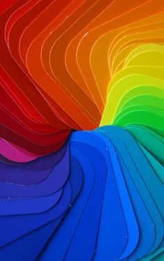 an abstract rainbow colored background with lots of lines