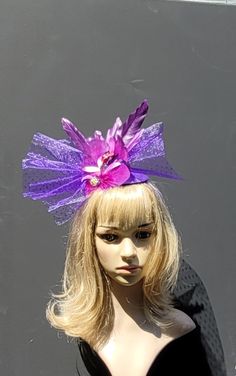 Purple flower surrounded by purple glittered netting, accented with purple artistic feathers and purple jewels.  Step out in style this season werring this lovely flower fascinator headband. Bride Fascinator, Purple Fascinator, Headband Fascinator, Flower Fascinator, Fascinator Headband, Floral Headband, Fascinator Hat, Fascinator Hats, Floral Headbands