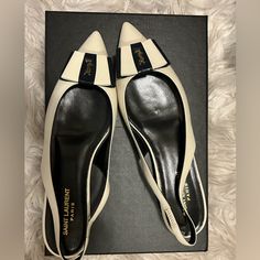 Selling These Saint Laurent Anas Slingback Flats In Smooth And Patent Leather (Navy) Size 39. See Photos For Signs Of Wear. Cream Leather Slingback Pumps For Evening, White Slingback Pumps With Leather Sole For Evening, Chic White Slingback Pumps With Leather Sole, White Flat Heel Slingback Pumps For Evening, Luxury Beige Slingback Pumps For Work, Designer White Slingback Pumps For Evening, Chic White Slingback Sandals For Evening, Chic Cream Slingback Pumps With Flat Heel, Classic White Slingback Sandals For Evening