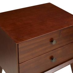 a wooden dresser with two drawers on one side and an open drawer on the other