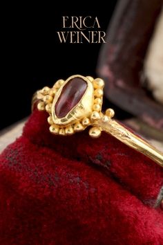 This Late Medieval Garnet Cabochon Ring was made at the tail end of the Middle Ages and the dawn of the Renaissance! We offer antique jewelry sourced with the utmost care. All of our jewelry is one-of-a-kind, check out our collection today! 1400s Jewelry, Ceremonial Byzantine Rings With Historical Design, Medieval Hand Forged Ceremonial Jewelry, Ceremonial Byzantine Jewelry With Cabochon, Ceremonial Byzantine Cabochon Jewelry, Byzantine Ring With Cabochon, Medieval Ring, Royal Rings, Period Jewelry