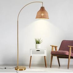 Dovecove Deantrei 72.44“ Arc Rattan Floor Lamp & Reviews | Wayfair End Table With Lamp, Modern Arc Floor Lamp, Modern Standing Lamps, Rattan Floor Lamp, Floor Lamp For Living Room, Rustic End Tables, Gold Floor Lamp, Floor Lamp With Shelves, Rattan Lamp