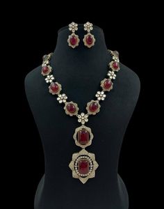 Dazzling  Doublet Stone statement Necklace detailed with Cz Stone work with matching earrings Suitable to wear in any occasions and ceremonies.  You can wear it with Saree,  lehenga, Kurtis and Wedding Gowns  Necklace length: 22 without the cord Earrings length: 1.5 inches Highest quality and craftsmanship Since natural semiprecious beads are used in this necklace, Color and shape of the beads may vary slightly Please let me know if you have any questions Luxury Stone Work Jewelry Sets For Festive Occasion, Elegant Formal Jewelry Sets With Stone Work, Elegant Hand Set Kundan Necklace For Reception, Elegant Stone Work Jewelry Sets For Formal Occasions, Festive Dazzling Kundan Necklace For Formal Occasions, Luxury Wedding Jewelry Sets With Stone Setting, Elegant Hand-set Kundan Necklace For Reception, Luxury Jewelry With Stone Setting For Reception, Elegant Jeweled Jewelry Sets For Reception