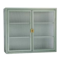 a green metal cabinet with two doors