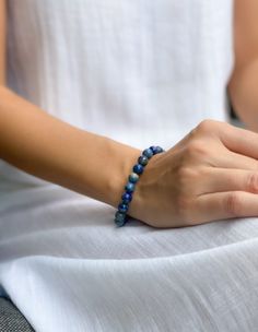 Lapis lazuli is a powerful stone for spiritual growth and enlightenment. This bracelet is designed to help you connect with the wisdom and power of lapis lazuli, and to promote your ongoing spiritual growth. The beautiful blue color of the stone is said to be associated with the divine, and wearing it can help you access your inner guidance and intuition. Spiritual Sapphire Beaded Gemstone Bracelets, Blue Labradorite Bracelet As A Gift, Blue Labradorite Bracelet, Spiritual Lapis Lazuli Round Beads Bracelets, Spiritual Lapis Lazuli Beaded Bracelets, Blue Lapis Lazuli Gemstone Beaded Bracelet, Lapis Lazuli Natural Stone Bracelet As A Gift, Blue Lapis Lazuli Bracelets With Natural Stones, Lapis Lazuli Round Beads Bracelets For Meditation