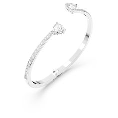 Artful simplicity and a hint of romance make this Swarovski bangle an ideal gift for a special person. The rhodium-plated design is supremely elegant and features two beautiful interconnecting heart-shaped stones as a centerpiece. A gorgeous gift to make your loved one's eyes sparkle. Article no.: 5535289 Collection: Attract Soul Size (oval-shaped): 2 3/8 inches x 1 7/8 inches Material: Crystals, Rhodium plated, Zirconia Color: White Charms Pandora, The Bangles, Gorgeous Gift, Bracelet Gold, Diamond Bracelets, Gold Fashion, Pandora Charms, Rhodium Plated, Stone Color