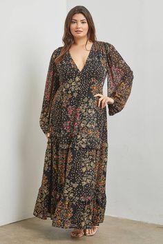 Make an unforgettable entrance in this ultra-sizzling maxi dress! Featuring a deep V-neck, long sleeves, and a swoopsing thigh-high split, this smokin' piece is sure to make all eyes on you. Strut your stuff in style with this plus size showstopper! The Pretty Reckless, Neck Ruffle, Tiered Maxi Dress, Floral Maxi, All About Eyes, Thigh Highs, Black Maxi Dress, Floral Maxi Dress, The Struts