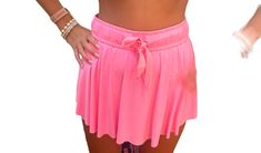 High waisted mini athletic skort with shorts underneath. Skirt is higher on the sides and lower in the back for more coverage. Barbie Pink color. Summer Sporty Skort With Built-in Shorts, Spring Cheerleading Skort With Built-in Shorts, Stretch Tennis Skirt With Built-in Shorts For Day Out, Chic Summer Tennis Skirt With Built-in Shorts, Spring Casual Skort With Waistband, Casual Skort With Waistband For Spring, Casual Spring Skort With Waistband, Cheerleading Mini Skirt Bottoms With Built-in Shorts, Cheerleading Mini Skirt With Built-in Shorts