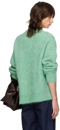 Brushed stretch knit alpaca wool- and nylon-blend sweater. · Rib knit collar, hem, and cuffs · Dropped shoulders Supplier color: Verde Green Wool Sweater With Ribbed Collar, Cozy Green Sweater With Ribbed Collar, Green Sweater With Ribbed Cuffs For Work, Fall Mohair Sweater With Ribbed Cuffs, Winter Green Polo Sweater With Ribbed Cuffs, Green Winter Polo Sweater With Ribbed Cuffs, Green Turtleneck Sweater With Ribbed Cuffs, Casual Mohair Sweater With Ribbed Cuffs, Latest Sweater