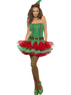 a woman dressed in a green and red christmas costume with santa claus hat, striped stockings and tights