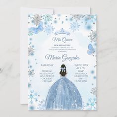 a blue and white wedding card with snowflakes on the front, featuring an image of a woman in a ball gown