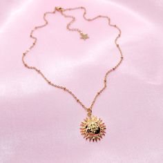 "This listing is for a resizable 18k gold plated sun charm necklace with gold plated stainless steel chain. Necklace is 16.5\" with a 2.5\" extension, max length is 19\". Great for layering!" Adjustable Gold Plated Charm Necklaces, Gold Charm Necklace With Sun Design, 14k Gold Necklaces With Sun Design, Gold Metal Jewelry With Sun Design, Gold Sun Design Jewelry, Tarnish Resistant Yellow Gold Charm Necklace In Stainless Steel, Gold Sun Design Metal Jewelry, Yellow Gold Stainless Steel Charm Necklace, Tarnish Resistant 14k Gold Filled Gold-tone Charm Necklaces