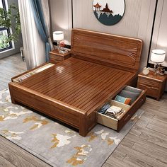 a wooden bed with drawers underneath it in a living room next to a large window