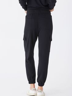 Indulge in ultimate comfort with Margot Modal Terry Cargo Jogger. Featuring a soft, wide elastic waistband for all-day comfort, and convenient cargo pockets for added functionality. Elevate your loungewear game with these joggers and experience a new level of relaxation. Versatile Activewear With Pockets For Loungewear, Functional Activewear With Pockets For Loungewear, Cargo Pants With Side Pockets For Workout, Workout Cargo Pants With Side Pockets, Black Sporty Activewear With Cargo Pockets, Sporty Black Activewear With Cargo Pockets, Relaxed Fit Athleisure Bottoms With Cargo Pockets, Athleisure Bottoms With Cargo Pockets And Relaxed Fit, Athleisure Joggers With Cargo Pockets For Workout