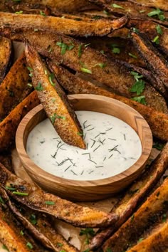 baked french fries with ranch dip in a wooden bowl