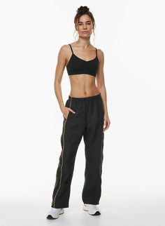 VICTORY TRACK PANT Nylon Sweatpants With Elastic Side Panels For Jogging, Nylon Athleisure Pants With Functional Drawstring, Sporty Nylon Sweatpants With Elastic Waistband, Sporty Straight Sweatpants With Elastic Side Panels, Sporty Sweatpants With Elastic Side Panels, Workout Nylon Pants With Elastic Side Panels, Sporty Nylon Cargo Pants With Functional Drawstring, Sporty Stretch Parachute Pants With Elastic Side Panels, Sporty Parachute Pants With Elastic Waistband For Jogging