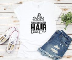 a t - shirt with the words roller coaster hair don't care on it