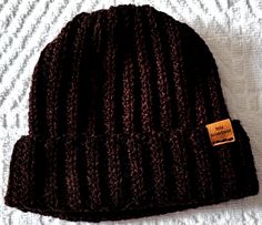 Crochet Beanie, Ribbed Beanie, Hat in Brown with Black Specks Fits Adult head up to 23 inches  Beanie is crafted from 100% Acrylic Yarn  Can be machine washed, lay flat to dry. Brown with Black Specks Fitted Brown Crochet Hat, Casual Style, Fitted Brown Crochet Hat Casual, Fitted Brown Crochet Hat, Handmade Fitted Brown Hat, Casual Fitted Brown Crochet Hat, Fitted Brown Knitted Hat, Adjustable Crochet Brown Hat, Adjustable Brown Crochet Hat, Handmade Brown Beanie Cap