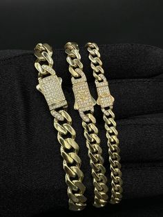 "14k Yellow Gold Monaco Miami Cuban Chain Bracelet Zirconia Box Lock ,6mm, 7mm and 9mm Real 14K Yellow Gold 14k Gold Bracelet, 14k gold Miami Cuban * Metal : Real 14K Yellow Gold, (Properly Stamped, 14K) * Condition : Brand New * Finish : Polished and Ready for wear  * Weight :  * Length : 7, 7.5, 8, 8.5 inches * Width : 6mm, 7mm and 9mm * Clasp/Bail : Box Clasp Lock with cubic zirconia (cz) These Chains made with solid 100% Authentic 14K Gold \"Not Plated or Filled\" This is a Beautiful Genuine Real 14K Gold Miami Cuban Chain and Will look Great on Men & Women. Cuban link chain, Miami Cuban chain, 14k gold Cuban chain, real gold chain, Cuban chain necklace, Cuban chain choker, Mens chain, chunky chain, trendy gold chain, unisex gold chain, yellow gold chain, thick Cuban chain, thin Cuban Gift Cuban Link Diamond Bracelet With 17 Jewels, Yellow Gold Diamond Cut Cuban Link Bracelet Gift, Gold Diamond Cut Cuban Link Bracelet, Gold Cuban Link Necklace Diamond Cut Gift, Gold Cuban Link Necklace With Diamond Cut, Gold Diamond Cut Cuban Link Necklace Gift, Gold Diamond-cut Cuban Link Necklace Gift, Gold Cuban Link Necklace With Diamond Cut As Gift, Gold Cuban Link Diamond Bracelet As Gift