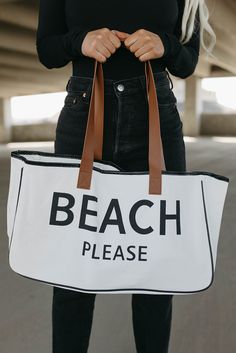 Elevate your beach day or summer outing with the "BEACH PLEASE" Large Canvas Tote Bag, a blend of style, functionality, and playful charm. Crafted from premium canvas material, this tote bag promises durability and resilience, ensuring it remains a staple in your summer wardrobe for years to come. The trendy "BEACH PLEASE" print adds a lighthearted and fashionable touch to your look, making it the perfect accessory for those sunny days by the sea or casual strolls in the city. With generous dime Sunshine In A Bag, Dreamy Whites, Beach Adventure, White Beach, Beach Please, Coastal Chic, Beach Print, Women's Wardrobe, Printed Bags