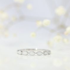 The Promise ring is more than just a piece of jewelry; it is a symbol of the eternal, unbreakable bond between a mother and her child. It represents that sacred unconditional love we have for our children. Timeless White Stackable Rings As Gift, Timeless White Stackable Rings For Gift, White Sterling Silver Halo Promise Ring, White Sterling Silver Halo Ring For Promise, Elegant Hypoallergenic Round Band Jewelry, Silver Infinity Stackable Rings For Wedding, White Promise Rings Fine Jewelry, Silver 14k Gold Halo Ring For Anniversary, Timeless Adjustable Promise Ring