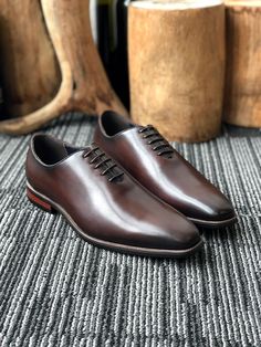 Step into timeless elegance with MSW Handmade Calfskin Leather Shoes. The sharpest dress shoe you'll ever own. Our wholecut oxford has a sleek profile that is guaranteed to turn heads. Crafted from genuine calfskin leather, these shoes blend luxury with comfort. The Fully Grain Leather Insole provide cushioning and support, while the Elegant 5 Eyelet design ensures a secure fit. Choose from a range of classic colors and various sizes to match your style. Meticulously Hand Polished and available Wholecut Oxford, Brown Oxford Shoes, Blazers Shoes, Brown Oxfords, Modern Gentleman, Dress Shoe, Leather Shoes, Timeless Elegance, Calf Skin