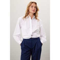 White poplin (100% Cotton). Top. Long sleeves. Collar. Front button closure. 19" from shoulder to hemline. Imported. Paper Bag Waist Pants, Rent The Runway, Closet Designs, Twist Front, Cotton Top, Waist Pants, Lauren Ralph Lauren, Button Down Shirt, Ralph Lauren