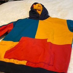 Nwot Urban Outfitters Colorblock Hoodie Multicolor Fleece Sweatshirt For Winter, Multicolor Fleece Winter Sweatshirt, Casual Multicolor Fleece Sweatshirt, Winter Color Block Cotton Sweatshirt, Winter Cotton Color Block Sweatshirt, Casual Cotton Outerwear With Color Block, Multicolor Kangaroo Pocket Sweatshirt For Streetwear, Multicolor Fleece Sweatshirt With Drawstring Hood, Multicolor Winter Sweatshirt With Kangaroo Pocket