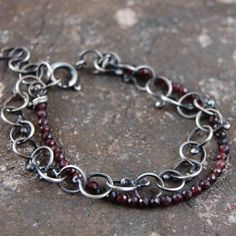 "Garnet silver chain bracelet. Dimensions: -stones 0.3 cm, 0.12\" -diameter of chain links approx 0.8 cm, 0.32\" -circuit 16 - 18 cm, 6.3 - 7.1\"" Bohemian Silver Chain Bracelet With Adjustable Chain, Dainty Handmade Silver Chain Bracelet, Sterling Silver Link Chain Bracelets, Silver Cable Chain Sterling Silver Bracelet, Sterling Silver Link Bracelets With Silver Chain, Sterling Silver Link Chain Bracelet With Adjustable Chain, Silver Cable Chain Metal Bracelets, Sterling Silver Cable Chain Bracelet In Silver, Sterling Silver Bracelet With Cable Chain In Silver