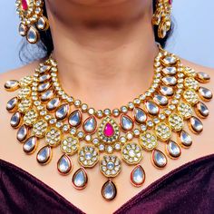 Exotic and snag-free kundan beaded necklace set with earrings. This is a stylish set with White Kundan. This set will work well with traditional, formal, and western formals. Option 1: White Color (D765) Option 2: Red Color (D766) Eye-catching and unique jewelry that will set you apart. Gift this piece to a loved one, and see their face light up with joy. Best for gifting or for personal use, wear it to any occasion and become the spotlight. Dual-tone Kundan Chandbali Necklace For Wedding, Dual-tone Chandbali Kundan Necklace For Wedding, Dual-tone Kundan Chandbali Bridal Necklace, Dual-tone Chandbali Kundan Bridal Necklace, Bollywood Style Dual-tone Kundan Necklace For Wedding, Red Bollywood Kundan Necklace For Formal Occasions, Elegant Dual-tone Kundan Necklace, Dual-tone Kundan Bridal Necklace For Celebration, Bollywood Style Kundan Bridal Necklace In Dual-tone