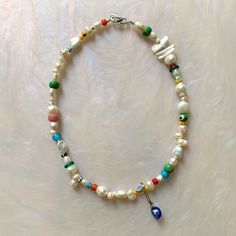 Mykonos is handmade with freshwater pearls, vintage trade beads, Czech glass beads, and sterling silver hardware • 18” *please allow for variation in color/shape with natural gemstones/pearls as they are sisters and not twins. * water safe Trade Beads, Pearl Gemstone, Color Shapes, Mykonos, Czech Glass Beads, Silver Hardware, Czech Glass, Fresh Water, Freshwater Pearls