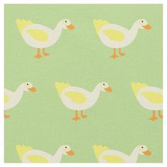 a green background with yellow ducks on it