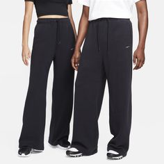 Keep your look elevated when temperatures drop. With added length and extra-plush high-loft fleece, these pants are loungewear you'll want to wear everywhere. Plush Pants, Nike Sportswear Phoenix Fleece, Sweatpants Nike, Wide Leg Sweatpants, Closet Essentials, Cold Hands, Swoosh Logo, Women Lifestyle, Nike Shorts