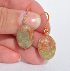 Multiple Autumn Jasper Earrings - Natural Gemstone Earrings -  Authentic Autumn Jasper gemstone - Multiple options:   (21 - 23)  18x13mm oval Autumn Jasper gemstone - gold-plated ear wire - overall earring lengths are 1.65 inches  (24 - 26)  18x13mm oval Autumn Jasper gemstone - silver-plated ear wire - overall earring lengths are 1.65 inches  "Autumn jasper helps to ground and center the wearer, providing support while inspiring tranquility." Please check out all my other listings for free shipping on combined items totaling $35+   Brenda's All About Beads shop includes Gemstone Pendants, Gemstone Earrings, Swarovski Crystal Earrings, Shell Earrings, Shell Pendants, Paua / Abalone Shell, Venetian Glass Earrings, Dichroic Glass Earrings, Holiday Earrings, and more!  New listings posted dai Handmade Jasper Earrings As Gift, Oval Stone Earrings Gift, Oval Stone Earrings For Gift, Dichroic Glass Earrings, Gemstone Pendants, Holiday Earrings, Jasper Earrings, Holiday Earring, Swarovski Crystal Earrings