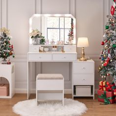 a white vanity with christmas trees and presents on it