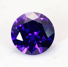 a purple diamond on a white background